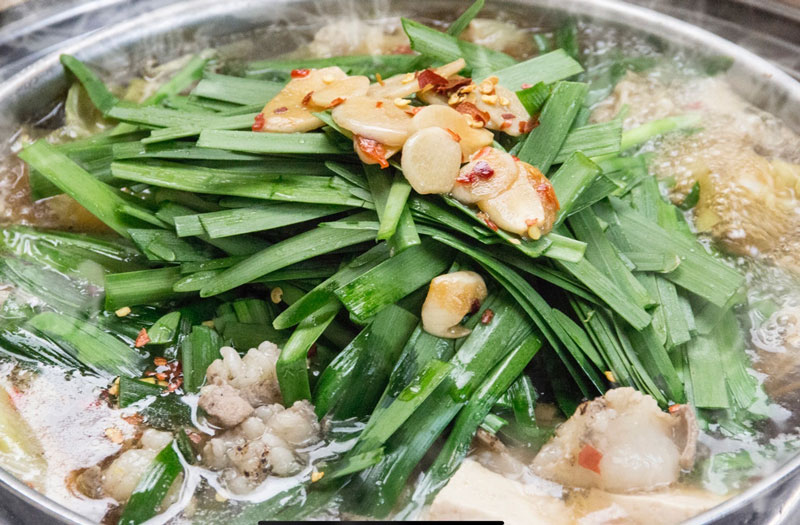 博多もつ鍋 一慶のKUOHKA店舗ページに掲載された料理写真：もつと野菜を煮込んだ鍋